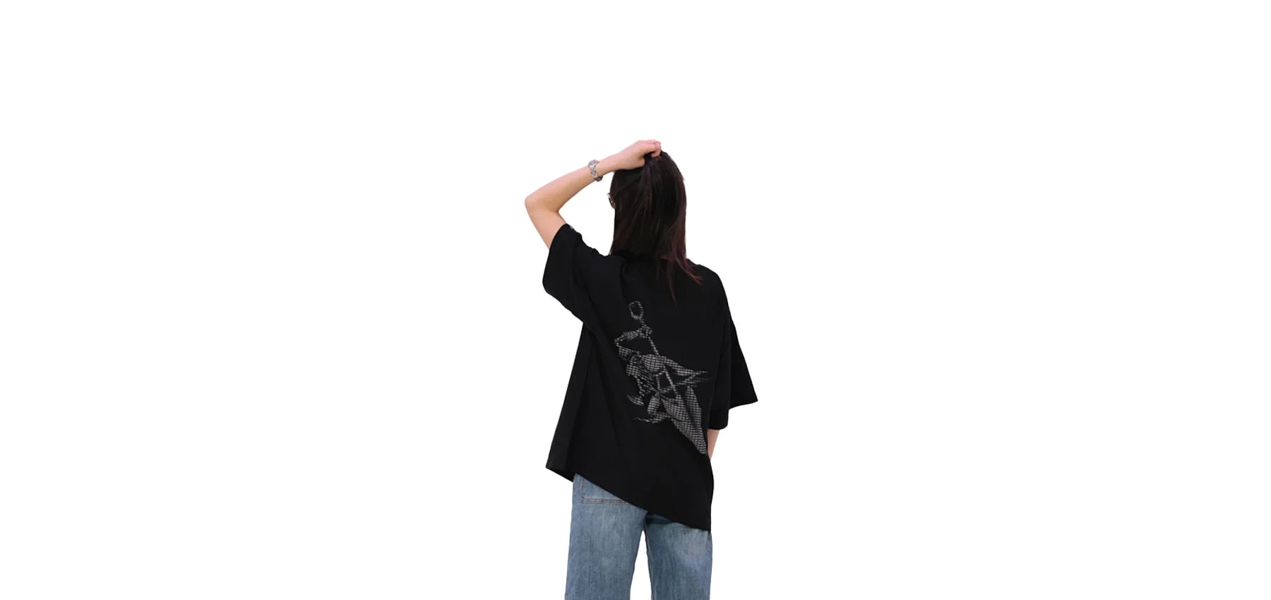 Back view of oversized black NO1 Apparels anime t-shirt, subtle anime clothing inspired by 86 featuring Undertaker personal mark graphic, worn by a female model.