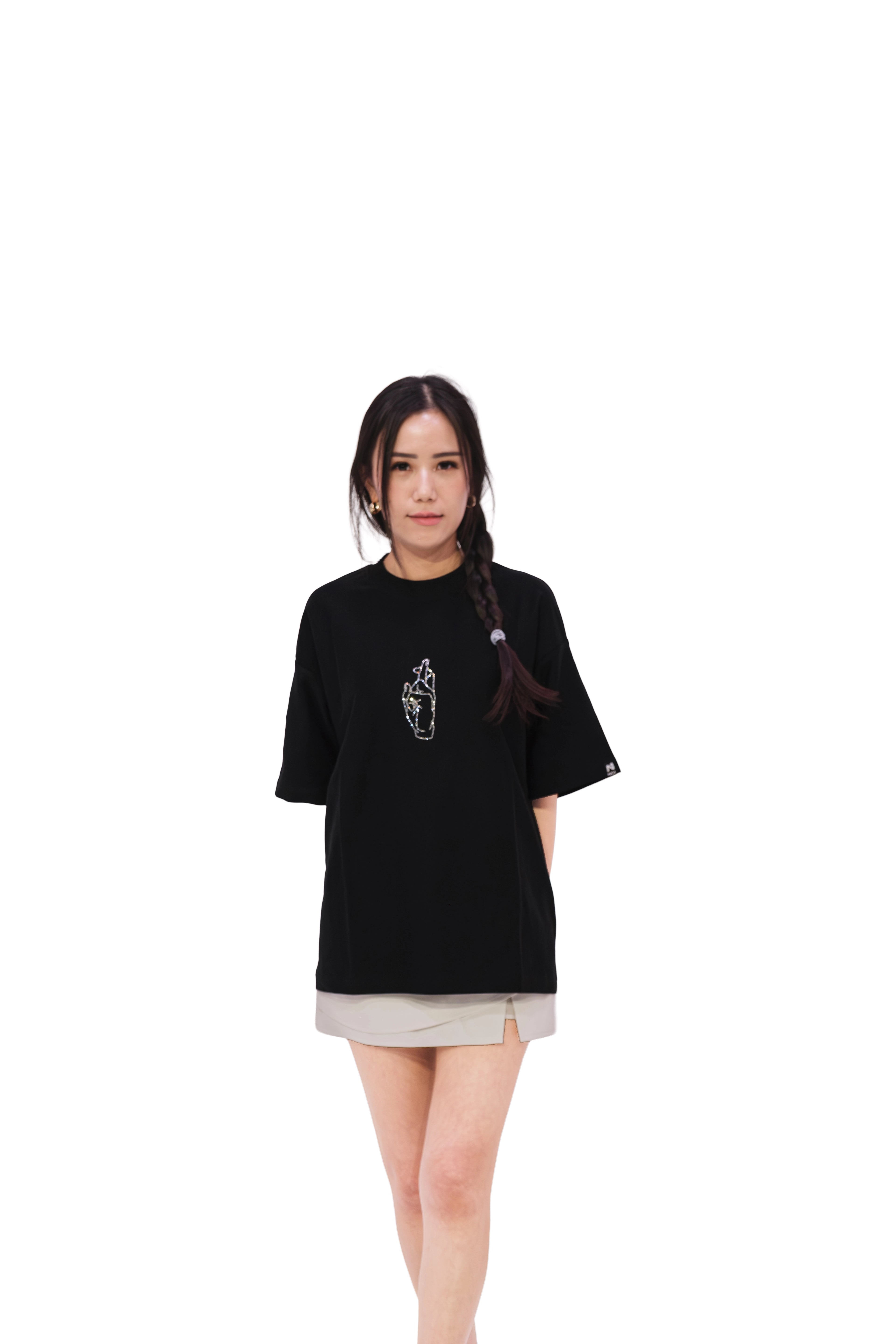 Front view of black oversized subtle anime t-shirt featuring rhinestone hand motif, inspired by Gojo Satoru’s iconic “Honored One” phrase from Jujutsu Kaisen. Premium streetwear by NO1 Apparels, worn by female model.